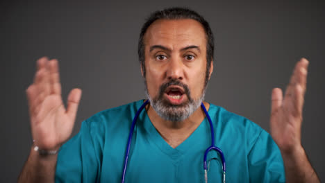Angry-Middle-Aged-Doctor-Shouting-Portrait